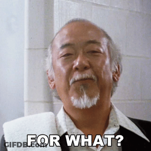 A Man With A Beard And A Towel Says " For What " GIF