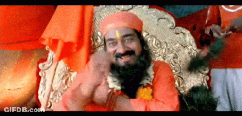 A Man With A Beard And A Turban Is Sitting On A Throne GIF