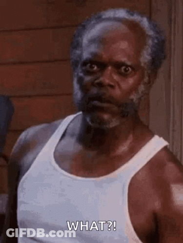 Bearded Man In White Tank Top Making Funny Face GIF