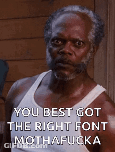 A Man With A Beard And A White Tank Top Says You Best Got The Right Font Mothafucka GIF