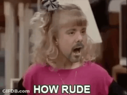 A Man With A Beard And Blonde Hair Is Wearing A Pink Shirt And A Girl 'S Bow Tie . GIF