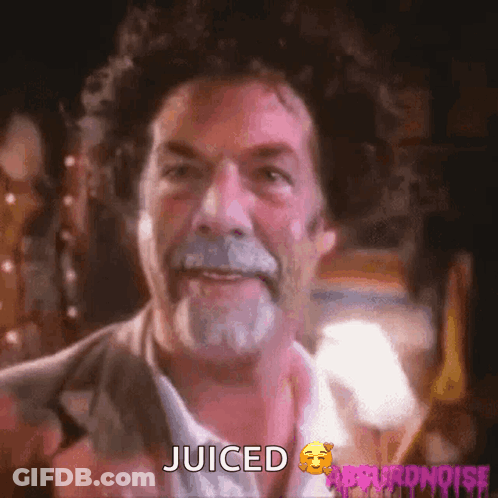 A Man With A Beard And Curly Hair Says Juiced On The Screen GIF
