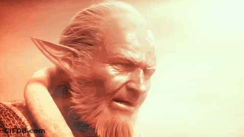 A Man With A Beard And Elf Ears Has A Very Angry Look On His Face GIF