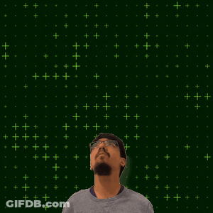 A Man With A Beard And Glasses Is Looking Up At A Glowing Number 20 GIF