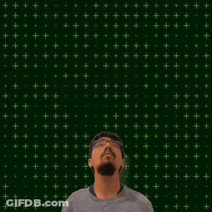 A Man With A Beard And Glasses Is Looking Up At The Number 14 GIF