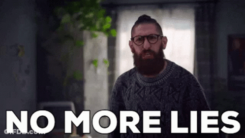 Bearded Man With Glasses In Living Room GIF