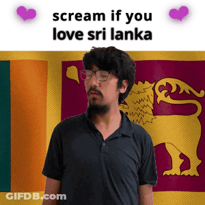 A Man With A Beard And Glasses Is Standing In Front Of A Sri Lanka Flag GIF