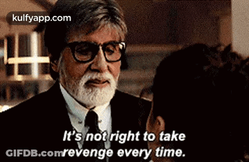 A Man With A Beard And Glasses Is Talking To A Woman . He Is Talking About Revenge Every Time . GIF