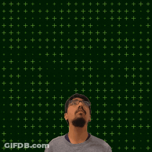 A Man With A Beard And Glasses Looks Up At The Number 24 GIF