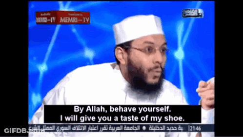 A Man With A Beard And Glasses Says By Allah Behave Yourself I Will Give You A Taste Of My Shoe .. GIF