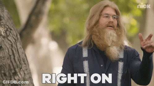 A Man With A Beard And Glasses Says Right On In Front Of A Tree GIF