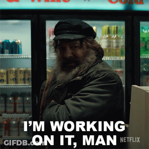 A Man With A Beard And Hat Says I 'M Working On It Man Netflix GIF