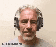 A Man With A Beard And Headphones On His Head . GIF
