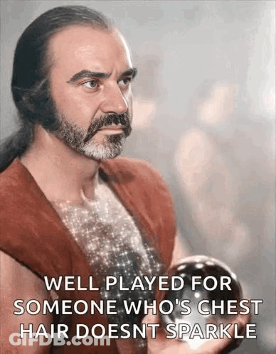 A Man With A Beard And Long Hair Is Holding A Ball In His Hand And A Quote . GIF