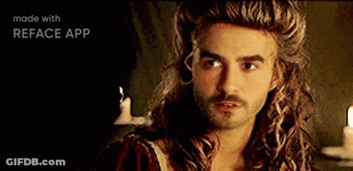A Man With A Beard And Long Hair Is Made With Reface App GIF