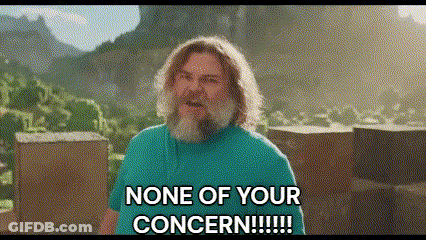 A Man With A Beard And Long Hair Is Standing In Front Of A Mountain And Says None Of Your Concern . GIF