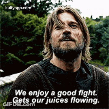 A Man With A Beard And Long Hair Is Talking About A Good Fight . GIF