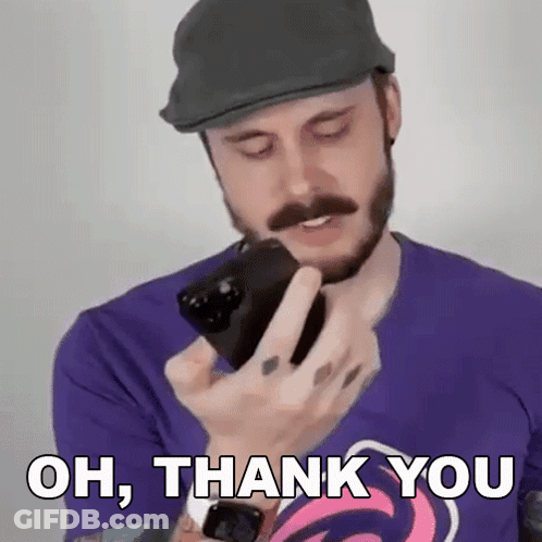 Man With Beard And Mustache Holding Cell Phone GIF
