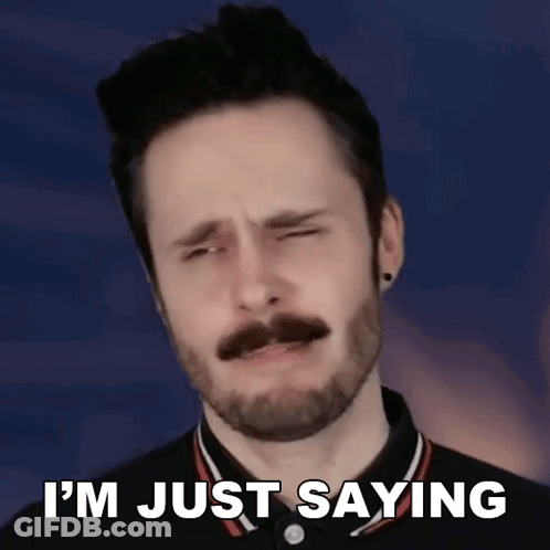 A Man With A Beard And Mustache Is Making A Funny Face And Says `` I 'M Just Saying '' . GIF