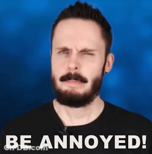 A Man With A Beard And Mustache Is Making A Funny Face With The Words Be Annoyed Written Below Him GIF