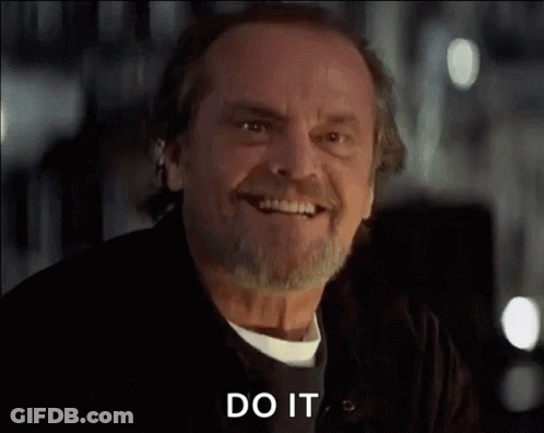 A Man With A Beard And Mustache Is Smiling And Says `` Do It '' . GIF