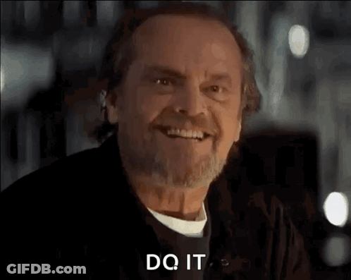 A Man With A Beard And Mustache Is Smiling And Says `` Do It '' . GIF