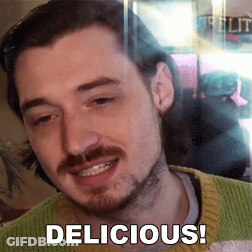 Smiling Man With Beard And Delicious Below GIF