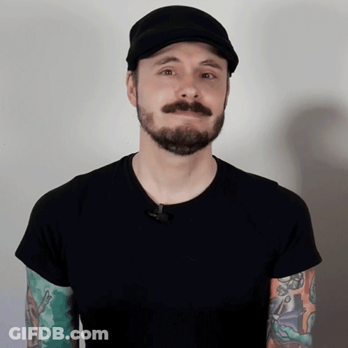 Man With Beard And Mustache Wearing Black Hat GIF