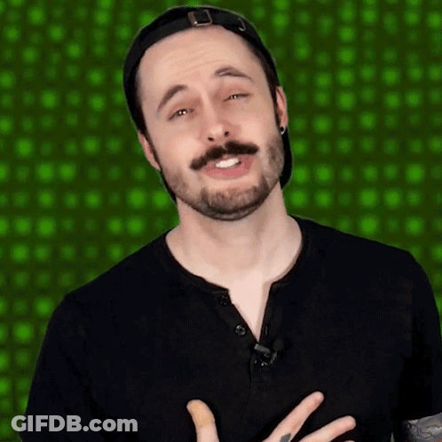 Man With Beard And Mustache In Black Shirt And Baseball Cap GIF