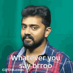 A Man With A Beard And Mustache Is Wearing A Plaid Shirt And Says `` Whatever You Say Brroo '' . GIF