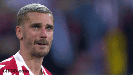 A Man With A Beard And Mustache Is Wearing A Red And White Striped Shirt GIF