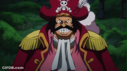 A Man With A Beard And Mustache Is Wearing A Red Pirate Hat With A Skull And Crossbones On It GIF