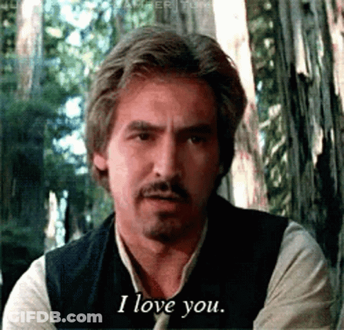 A Man With A Beard And Mustache Says I Love You GIF