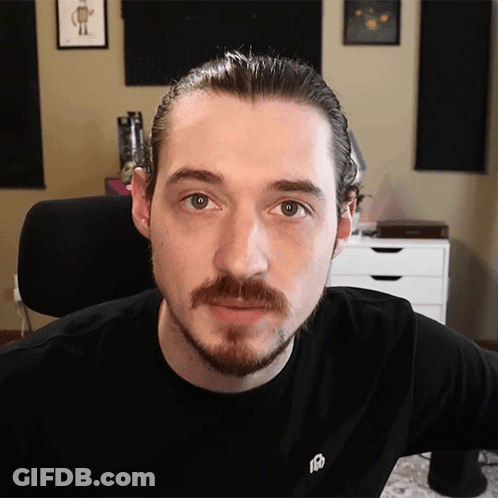Man With Beard And Mustache Wearing Black Shirt K GIF