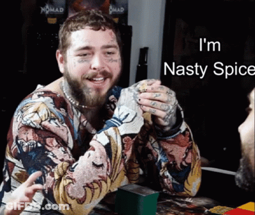 A Man With A Beard And Tattoos Is Smiling With The Words I 'M Nasty Spice Below Him GIF