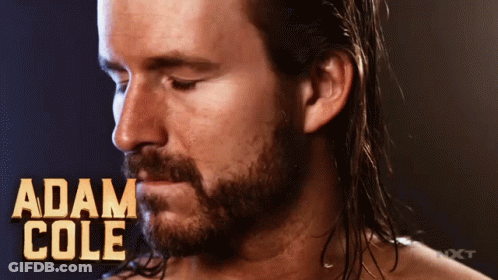 Man With Beard And Adam Cole Name On Chest GIF