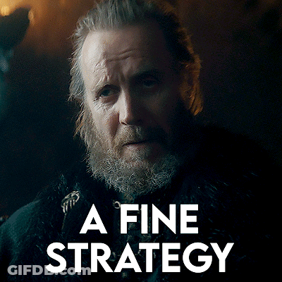A Man With A Beard And The Words " A Fine Strategy " Behind Him GIF