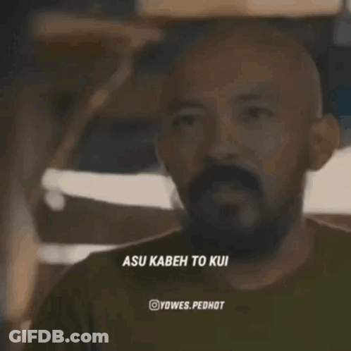 A Man With A Beard And The Words Asu Kabeh On The Bottom Right GIF
