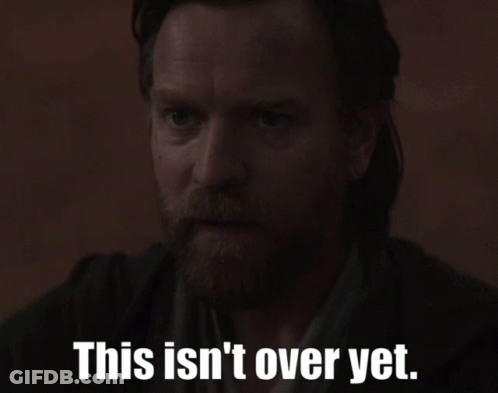 A Man With A Beard And The Words This Isn 'T Over Yet GIF