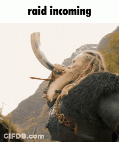 A Man With A Beard Blowing A Horn With The Words Raid Incoming Above Him GIF