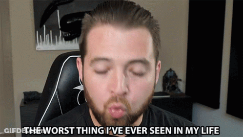 A Man With A Beard Blowing A Kiss With The Words " The Worst Thing I 'Ve Ever Seen In My Life " Below Him GIF