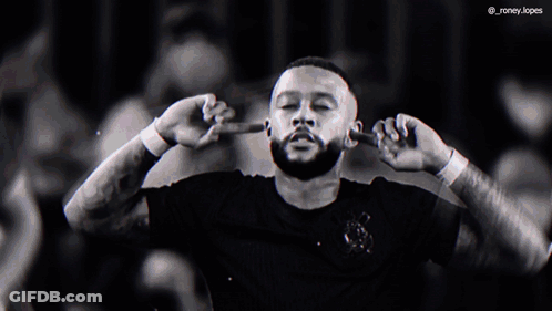 A Man With A Beard Covering His Ears With His Hands GIF