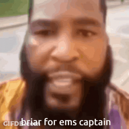 A Man With A Beard Has The Words Briar For Ems Captain Written Below His Face GIF