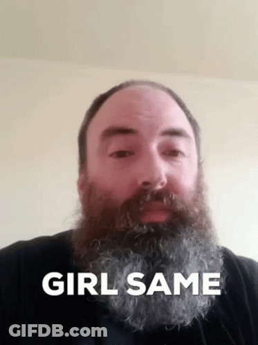 A Man With A Beard Has The Words Girl Same On His Face GIF