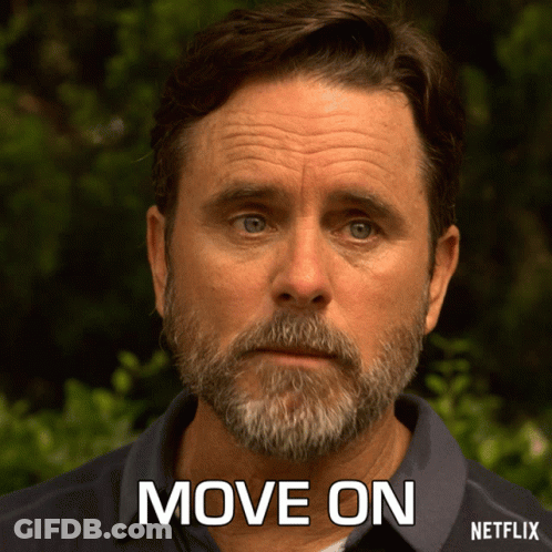 A Man With A Beard Has The Words Move On Written On His Face GIF