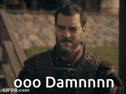 A Man With A Beard Has The Words Ooo Damnnn Written On His Face GIF