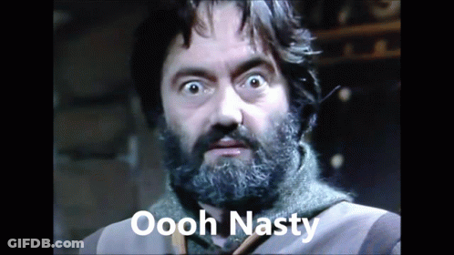A Man With A Beard Has The Words Oooh Nasty Written On His Face GIF
