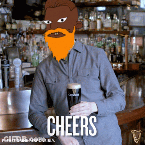 A Man With A Beard Holds A Glass Of Guinness Beer GIF