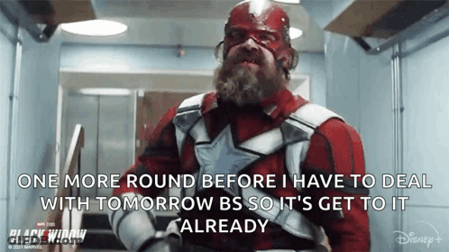 Man In Red And White Superhero Costume Standing In Hallway Quote GIF