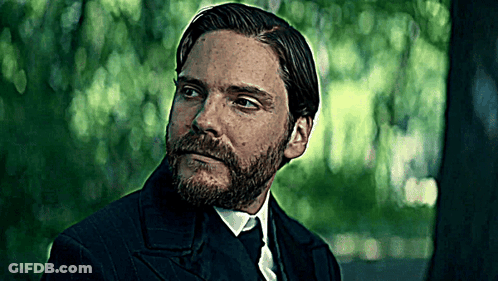 A Man With A Beard In A Suit And Tie GIF